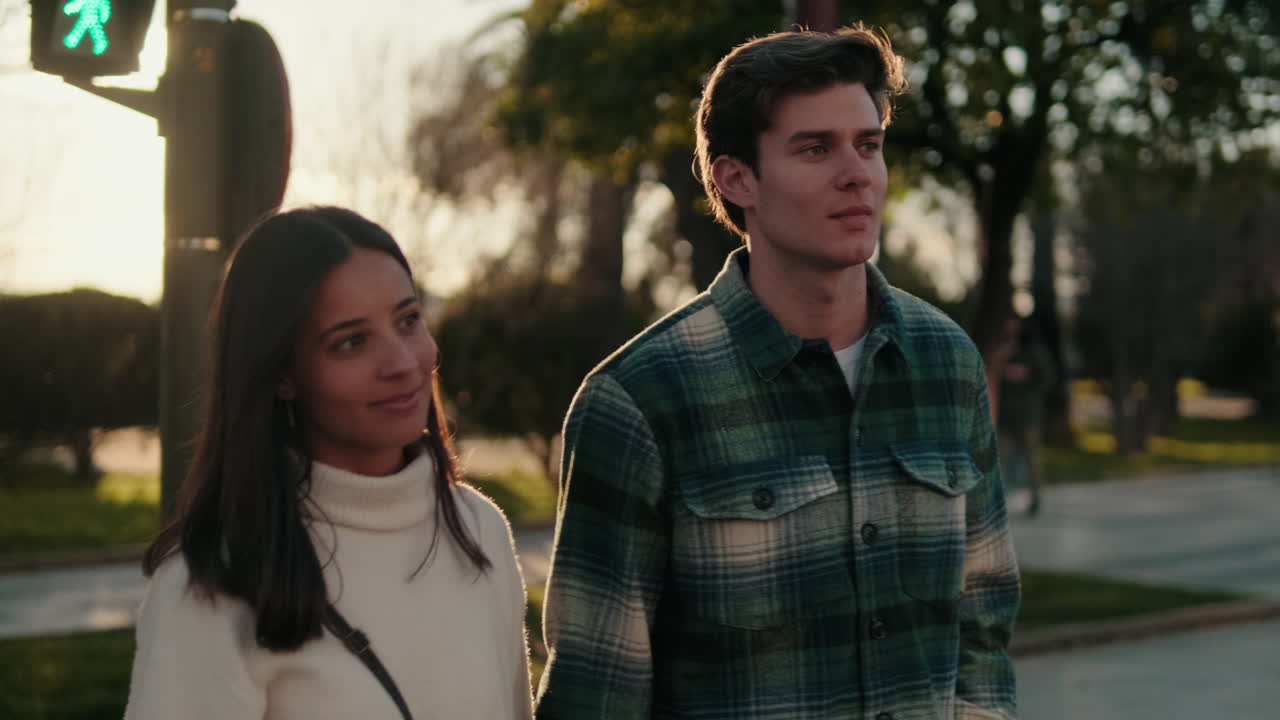 Young Couple Walking in Seville at Golden Hour