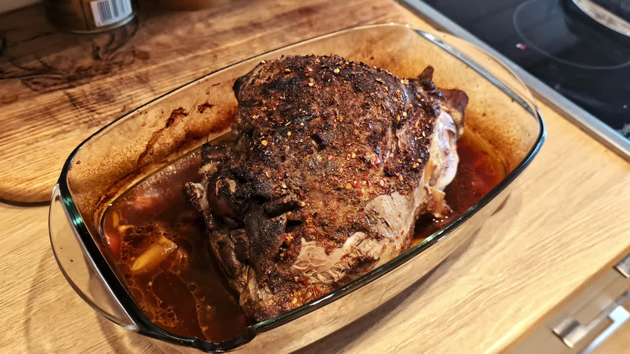 Prime Rib roast cooked in glass baking dish beef cut meat selection cooking roasting