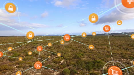red de iconos digitales contra la vista aérea del bosque y el cielo azul