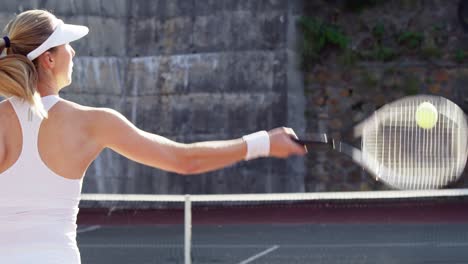 active sportswoman playing tennis