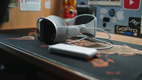 Closeup Of Apple Vision Pro 3D Camera On Table. revealing shot