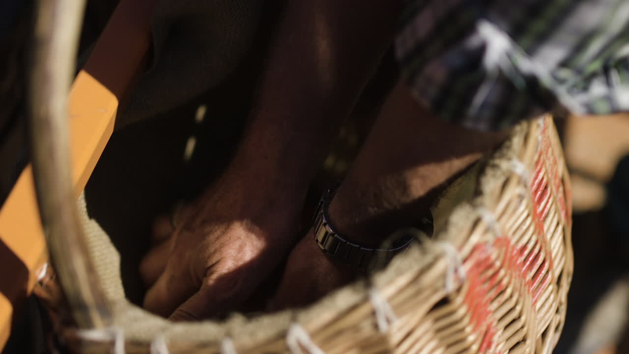 Picking apples from a basket