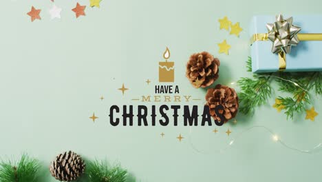 Animation-of-have-a-merry-christmas-over-decorations-and-presents-on-light-green-surface