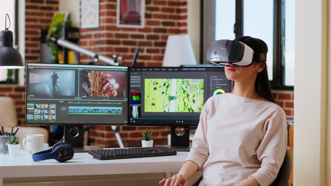 Asian woman video creator uses virtual reality headset at her desk