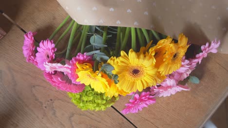 Flower-arrangement-of-gerbera-transvaal-daisies-from-the-top-in-slow-motion-4K