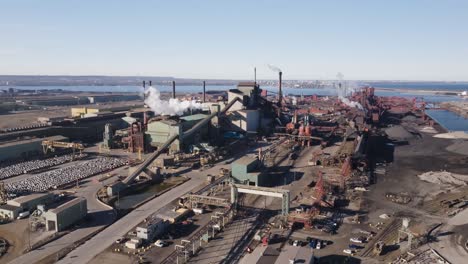 industrial complex in hamilton, ontario with clear sky, daytime, aerial view