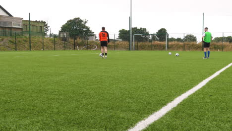 soccer players practicing on field, preparing for match with focused determination