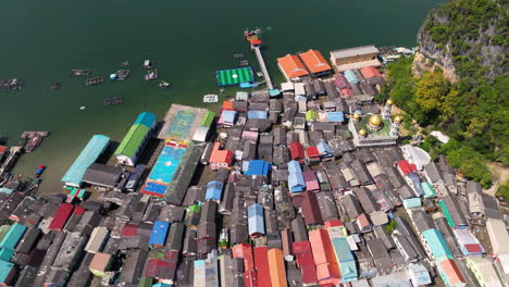 houses in koh panyee floating village in thailand - aerial drone shot