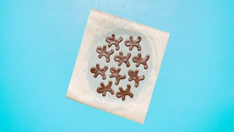 gingerbread man cookies making of. cutting and baking cookies.