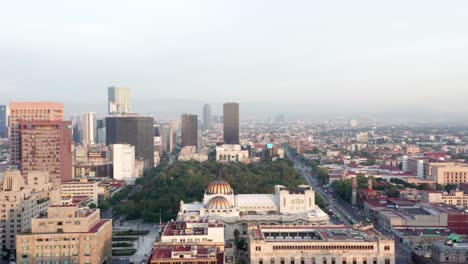 aerial shot of the alameda, the palace of fine arts and the skyline of the zone in mexico city
