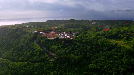 private jet plane turned into hotel on tropical coastal cliff in bali