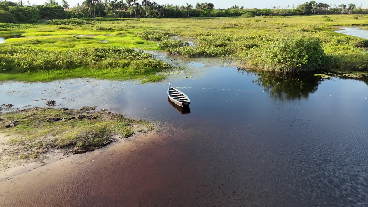 Isolated Canoe At Santo Amaro In Maranhao Brazil. Nature Landscape. Beautiful Rainforest. Isolated Canoe In Maranhao. Mangrove Scenery. Colored River. Native Village. Brazil Northeast