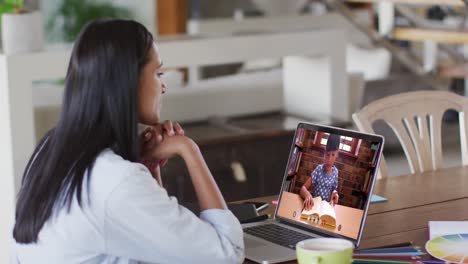 Caucasian-female-teacher-using-computer-on-video-call-with-schoolboy