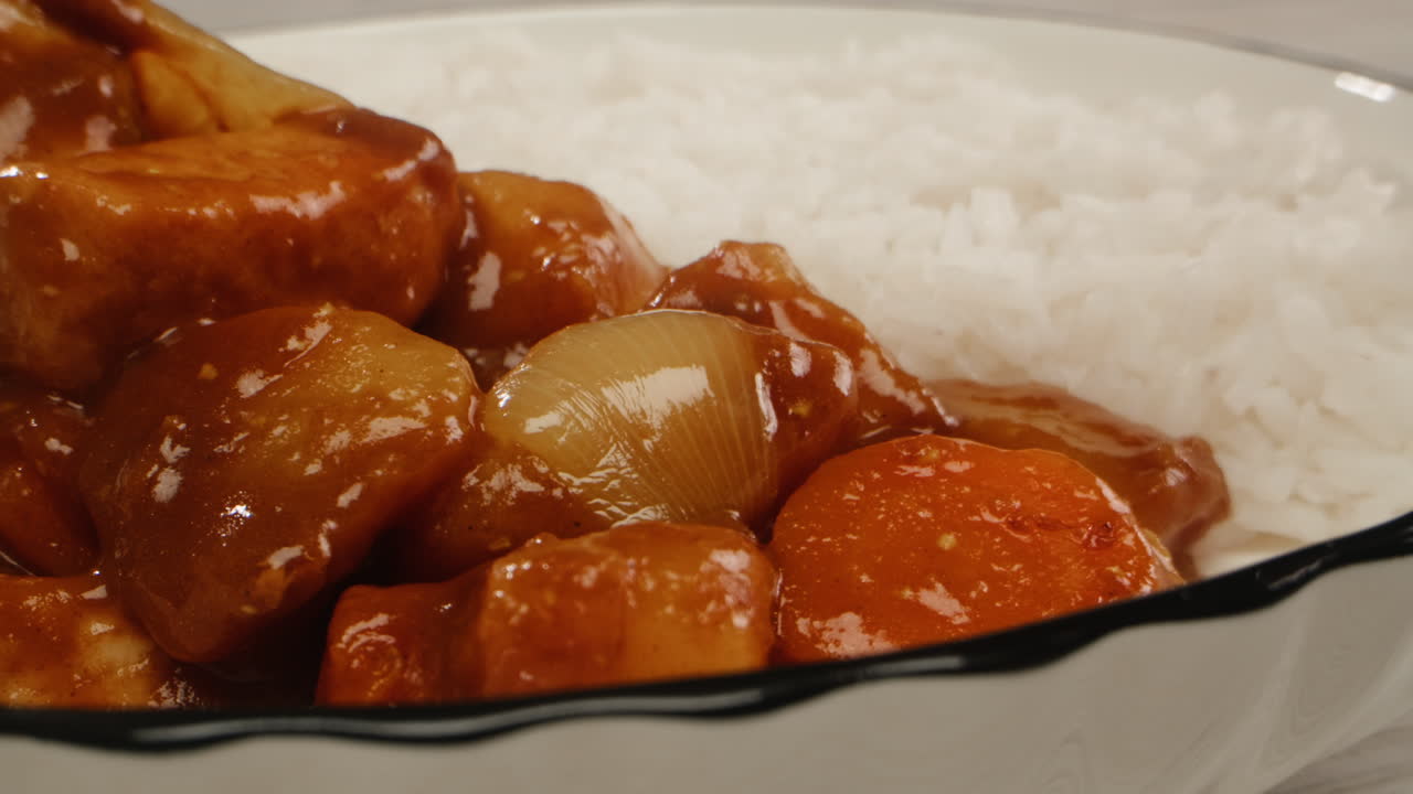 Japanese curry rice with fry pork Tonkatsu, Katsu Kare, Japanese breaded cooking dinner in restaurant, close up macro of asian food