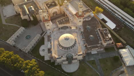 aerial top down shot of king fahd islamic cultural center mosque during sunset time in buenos aires