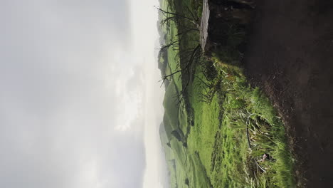 vertical-of-Sete-Cedades-of-mountains-and-Sao-Miguel-island-foggy-rainy-day-wild-nature-Azores-island