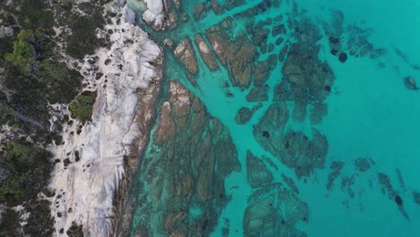 Top-down-view-of-the-famous-rocky-part-at-Kavourotripes-beach-in-Sithonia,-Chalkidiki,-Greece