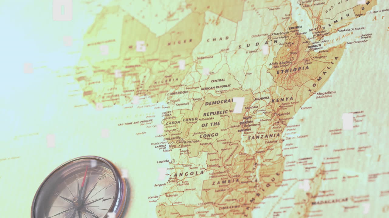 composición digital de múltiples números cambiantes contra la brújula y el mapa del mundo