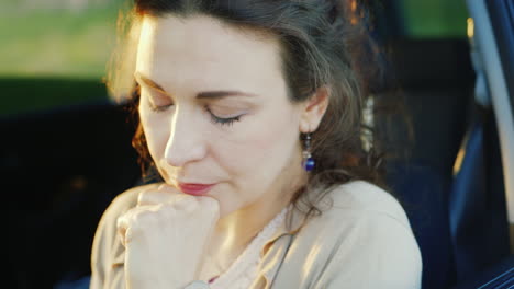 Portrait-Of-Caucasian-Woman-Crying-In-Car