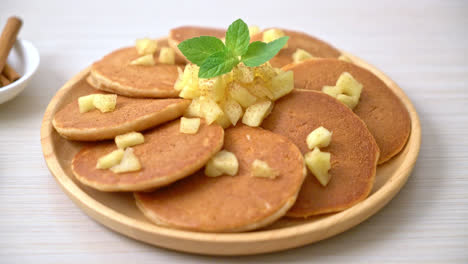 apple pancake or apple crepe with cinnamon powder