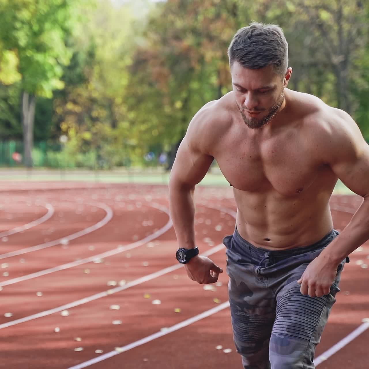 Young sportsman on stadium outside
