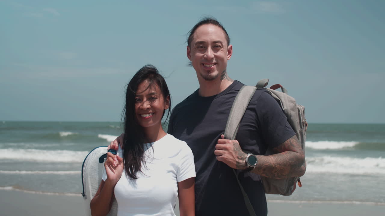 Couple standing at the beach