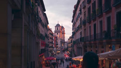 Toledo-street-and-church-real-colegiata-de-San-Isidro-in-Madrid-during-sunset-timelapse-close-to-Plaza-Mayor-city-center