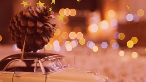 animación de decoración navideña con cono de pino y coche modelo sobre luces de hadas parpadeantes
