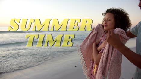 animation of summer time text over biracial couple embracing on beach