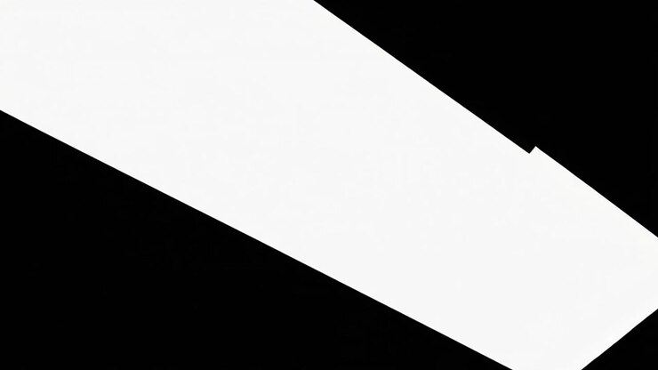 White Paper Sheet Folding and Disappearing into Black Background