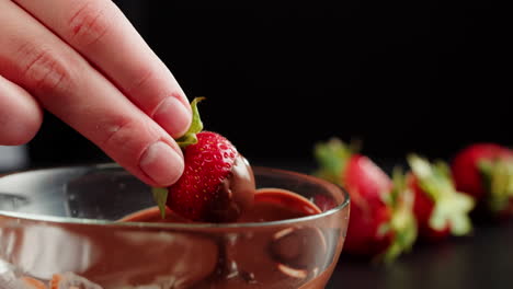 dipping strawberries in chocolate