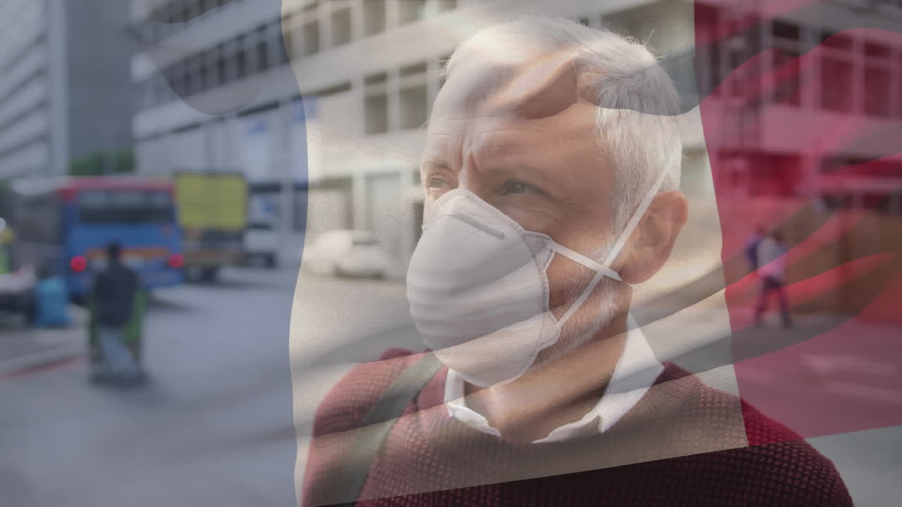 animación de la bandera de francia ondeando sobre un hombre que usa una máscara facial durante la pandemia de covid-19