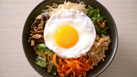 bibimbap, korean spicy salad with rice bowl - traditionally korean food style