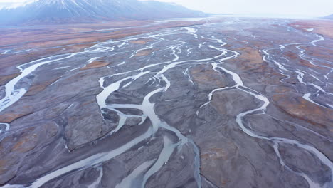 Aerial-shot-of-an-alluvial-fan-in-an-arctic-valley-2