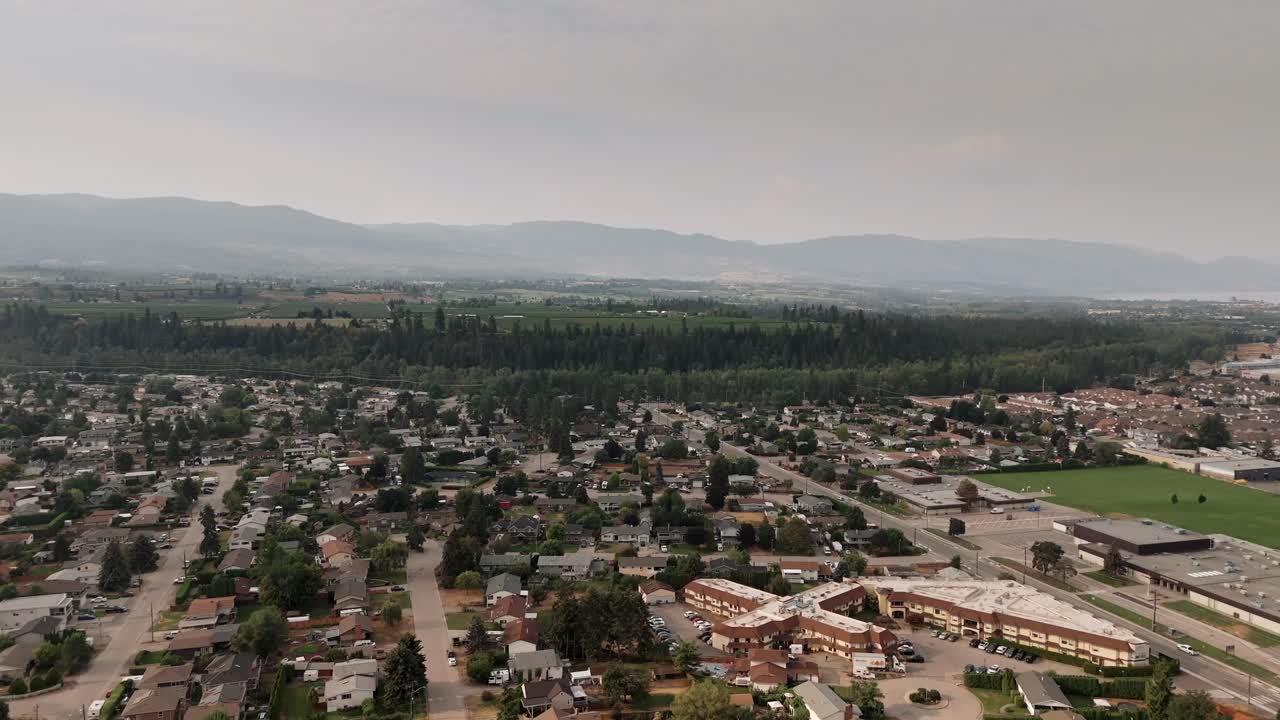 4K CGI aerial drone footage of Kelowna's stunning Okanagan Valley, showcasing its picturesque landscapes, vineyards, and sparkling lakes in vibrant detail.