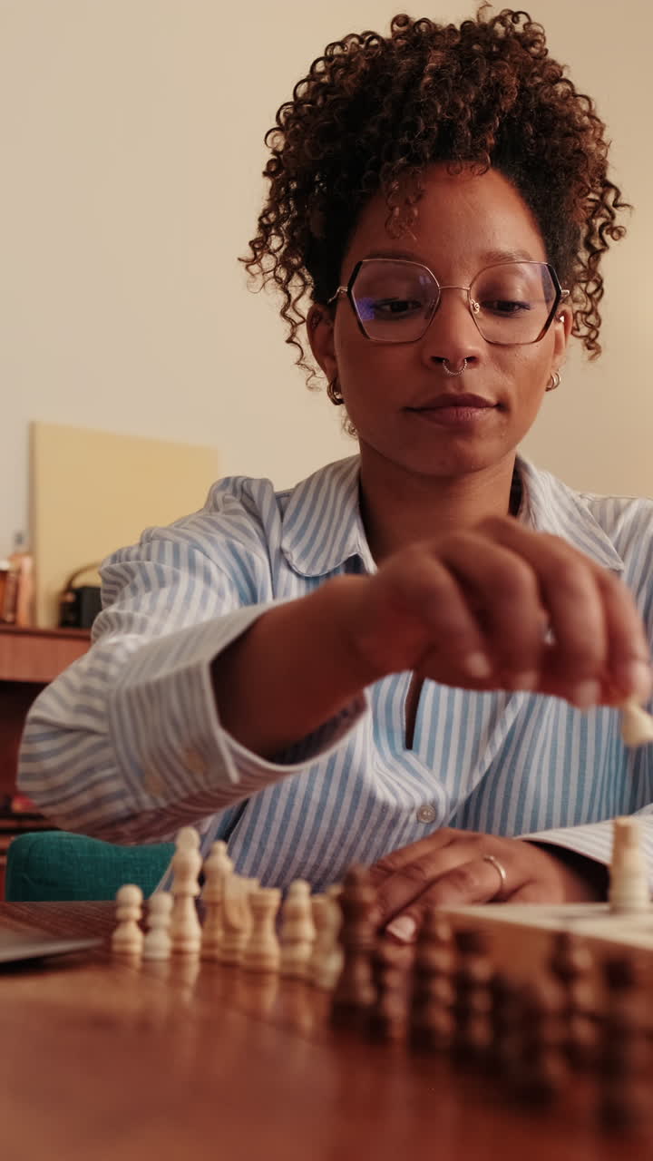 Woman Playing Online Chess at Home