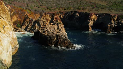 drone shot of waves crashing on scenic coastline at big sur state park off pacific coast highway in california 5