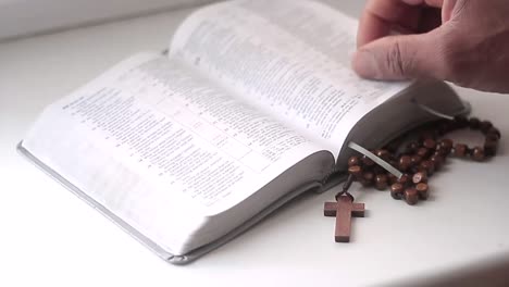 praying-to-god-with-hands-together-with-bible-and-cross-black-man-praying-with-black-background-stock-video-stock-footage