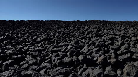 field of dark volcanic rocks