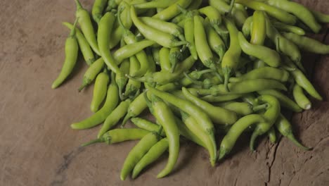 green pepper on wooden background