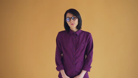 woman in plaid shirt with glasses