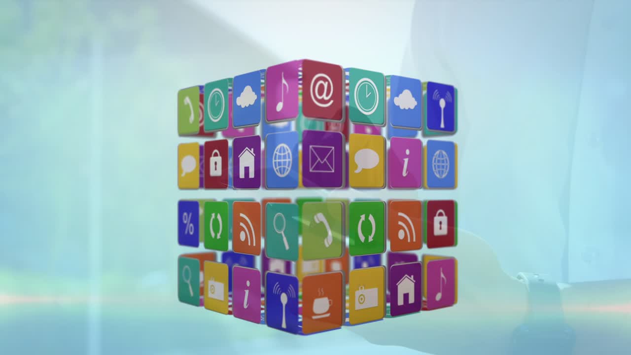 Animation of cube with icons over person using smartphone
