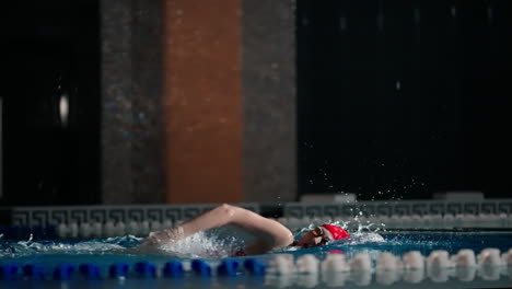 a swimmer in the pool doing a stroke