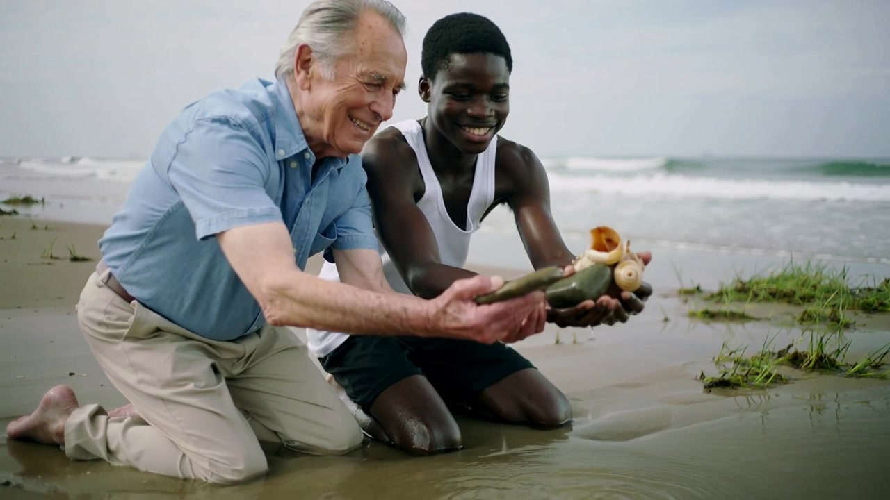 Spotting shells on shore, pair in blue shirt and white tank scooping conch shells to return