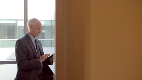 doctor meets with male patient in exam room shot on r3d