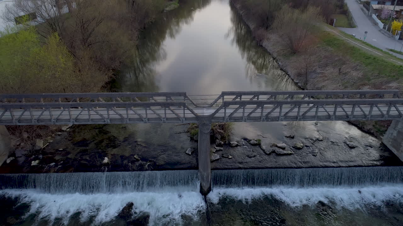 Aerial Drone Shot of a Bridge over a River at Sunset, 4k UHD