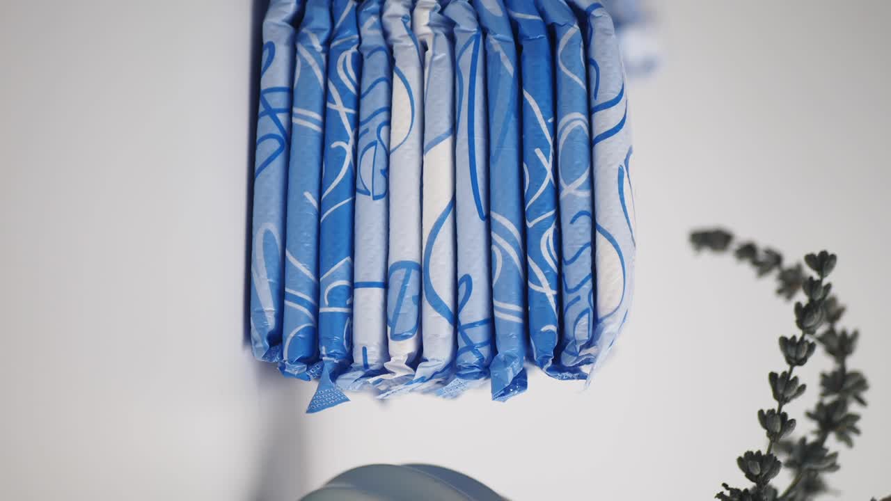 Stacked Feminine Hygiene Products with Lavender