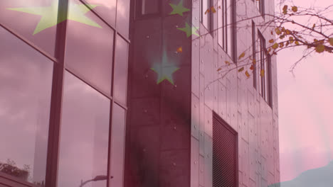 animación de la bandera china sobre los edificios de oficinas