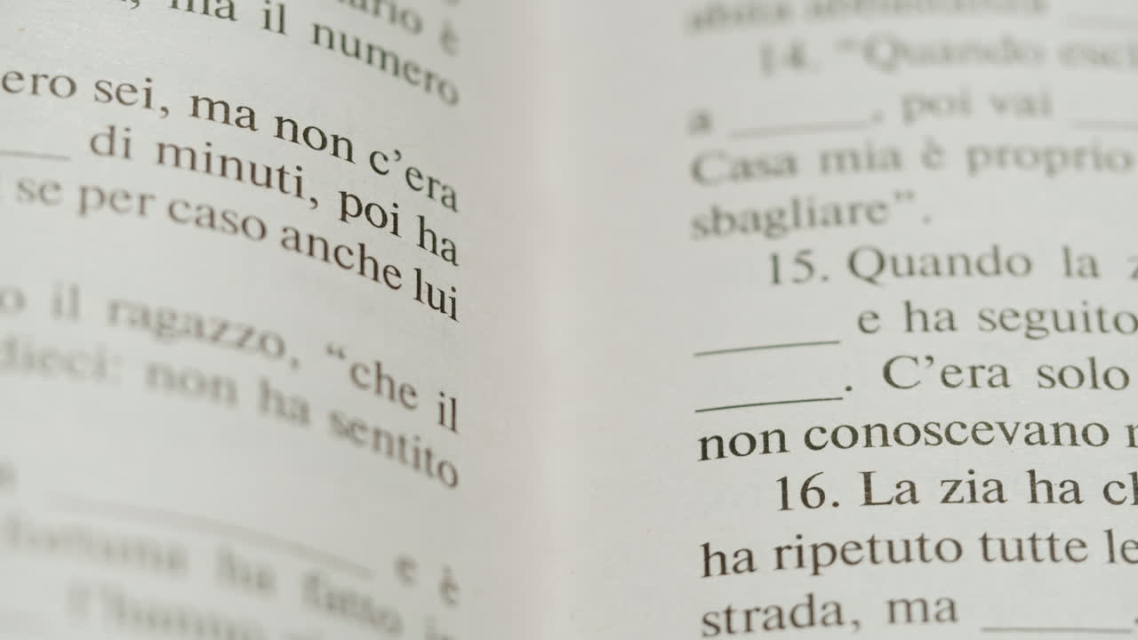 Close-up of a book page with Italian text and exercises