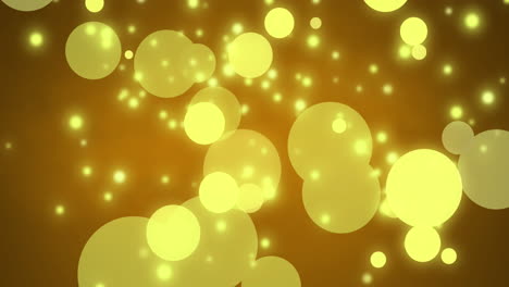 animation of yellow glowing spots falling on yellow background